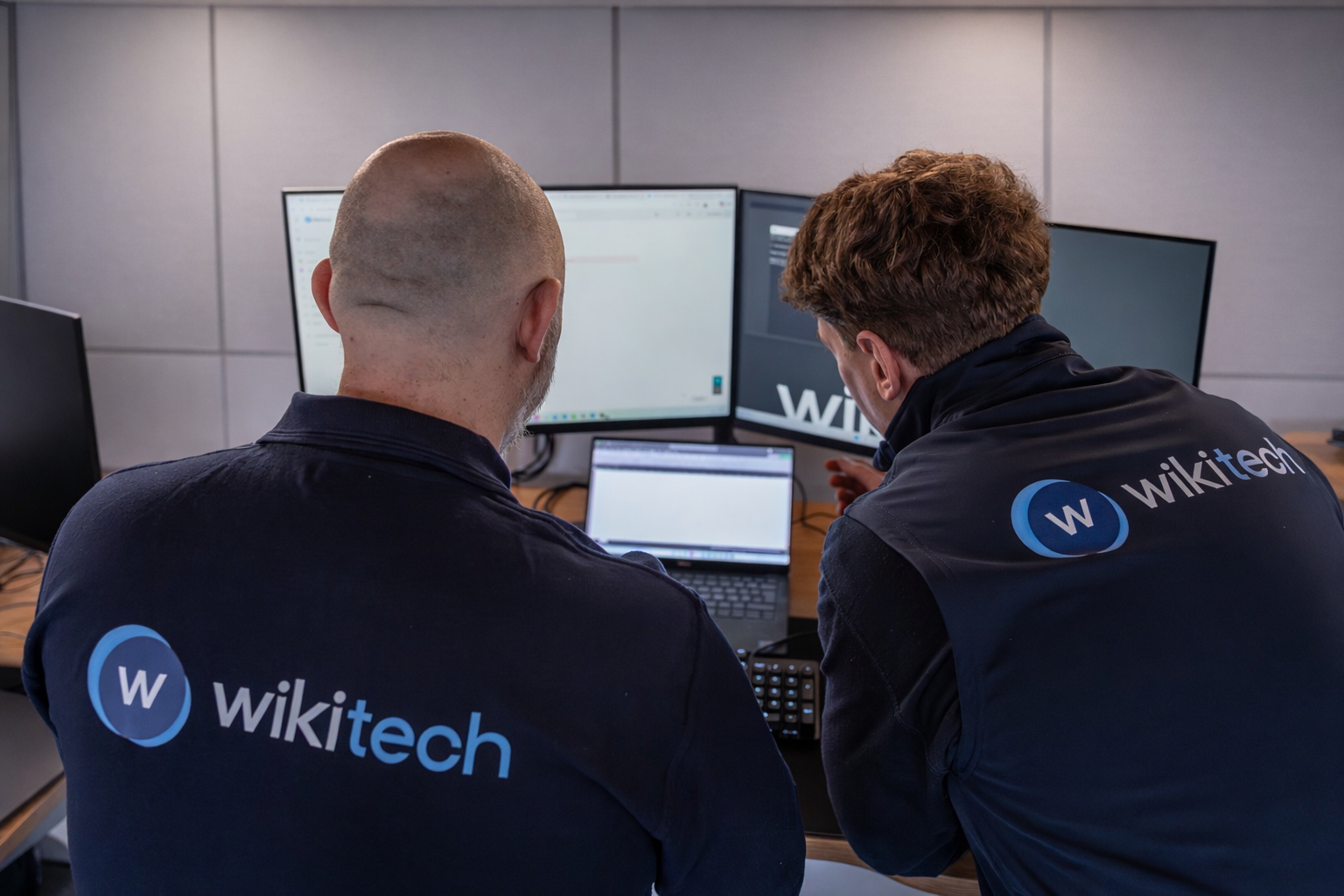 WikiTech engineers working together